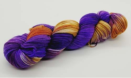 blue-purple, gold, and red yarn